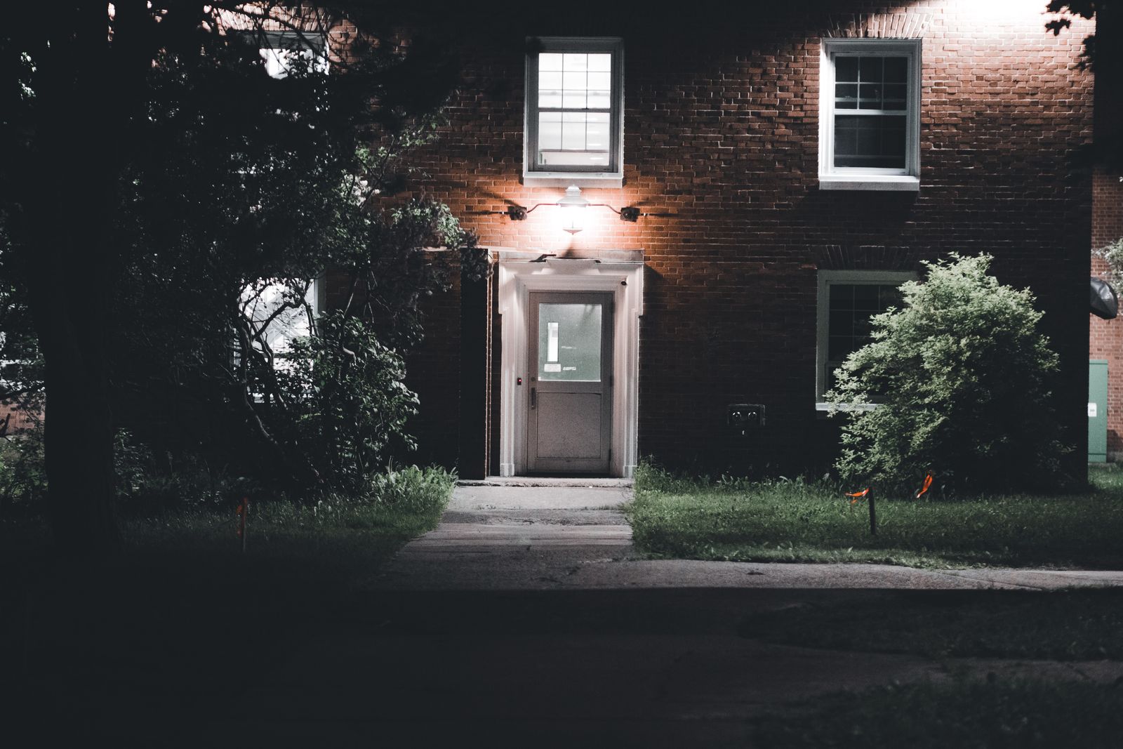 Warm exterior lighting on a residential property at night
